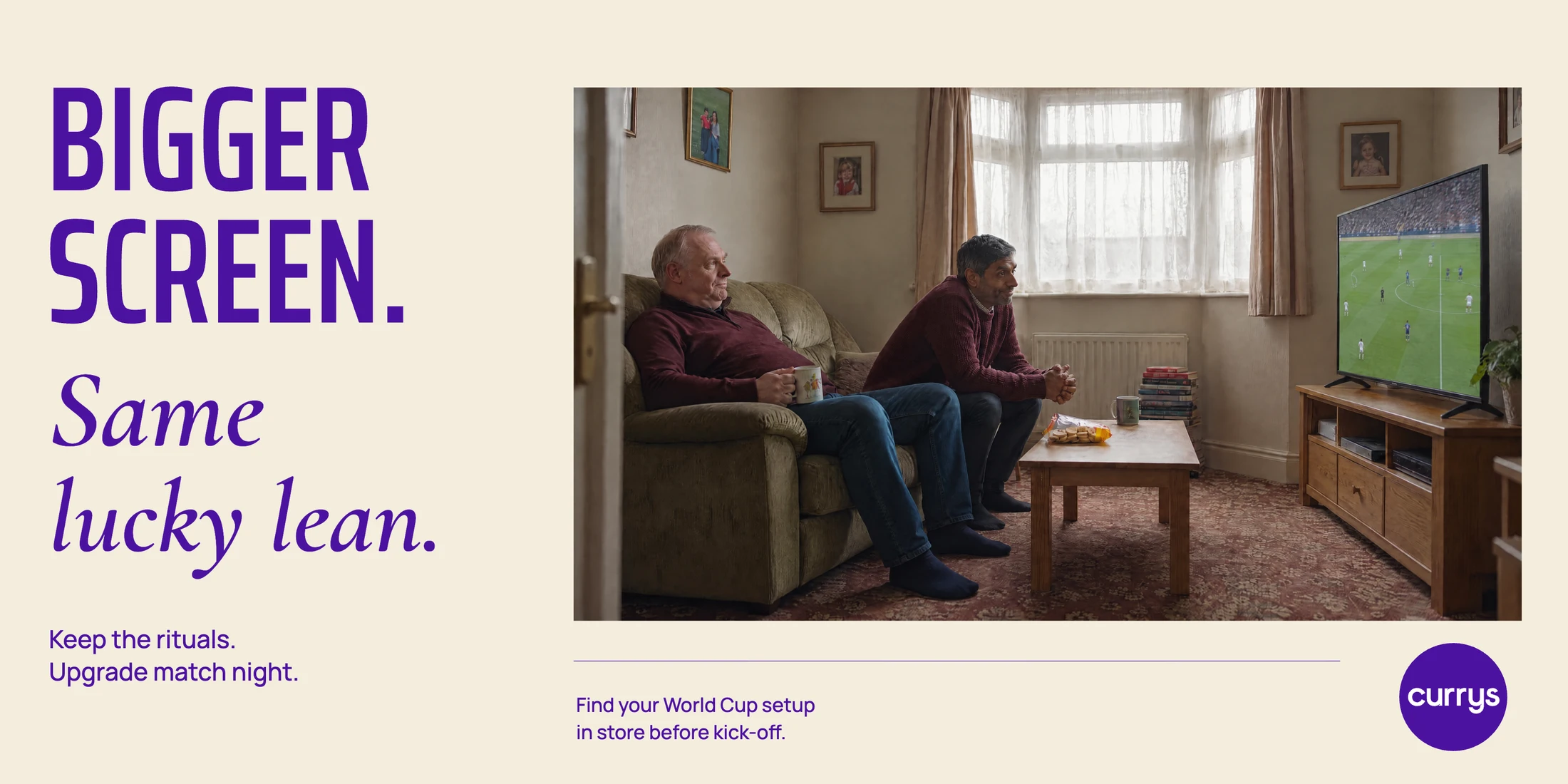 Bigger screen. Same lucky lean. Two friends watching football, one relaxed and one leaning forward.
