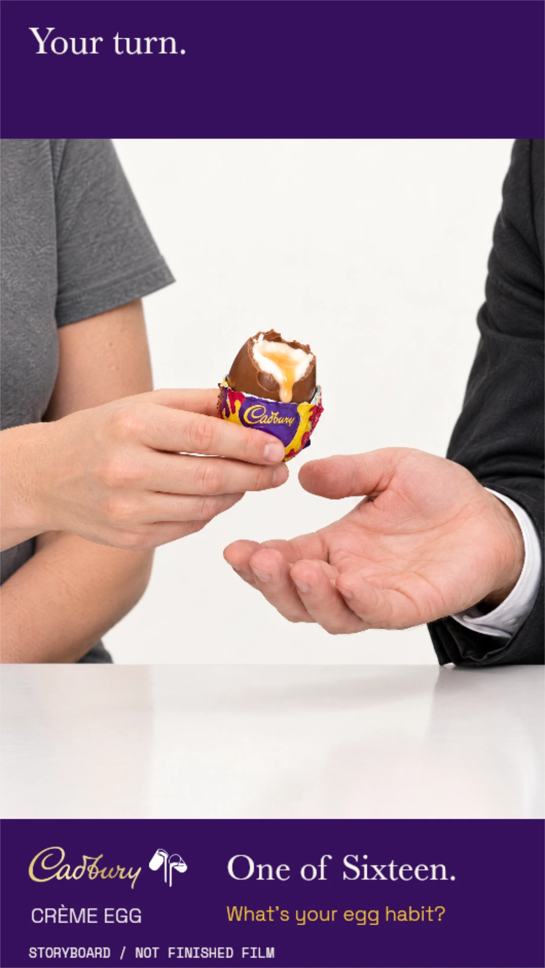 00–03 / The handover — Close-up. Grey-shirt woman, left, offers one bitten, goo-filled egg to the suited man on the right.